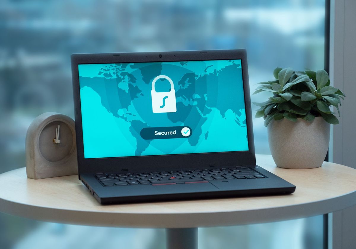 A laptop showing a security lock, representing protected data