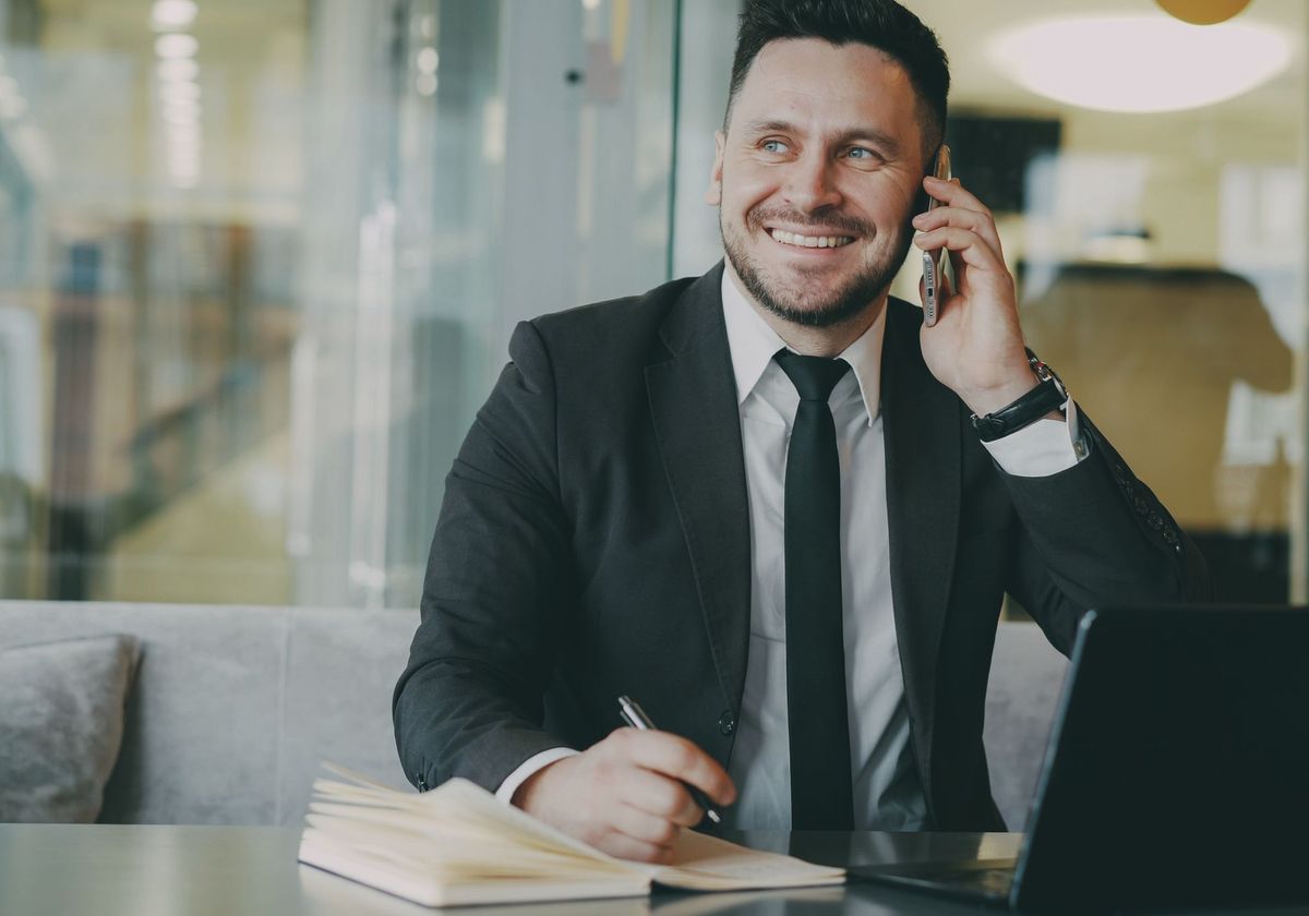 An A/R specialist following up with a payer by phone